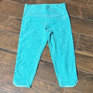 Peloton Heathered Teal Workout Leggings dolphin hem